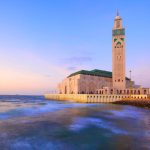 Panoramic view of Hassan 2 mosque at sunset during the 15-Day Grand Tour