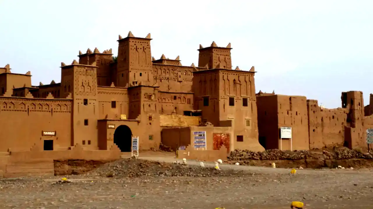 An earthen kasbah with crenellated mud-brick towers