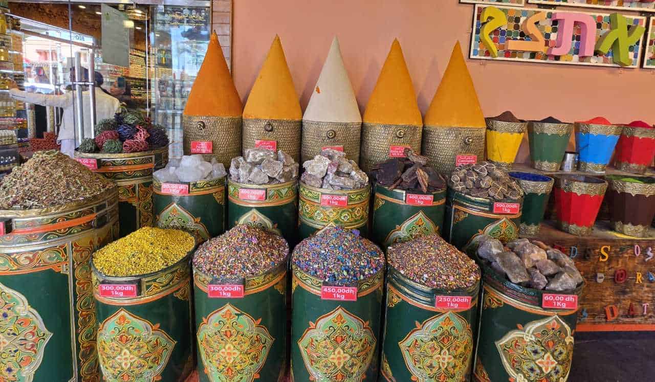 Cones of coloured spices on display at a Moroccan souk stall